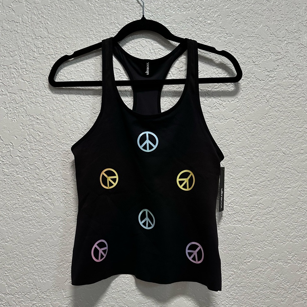 New Ultracor top - Size S & M & L- color:  black with peace signs